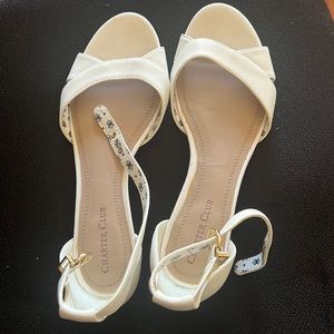 White wedge sandals.